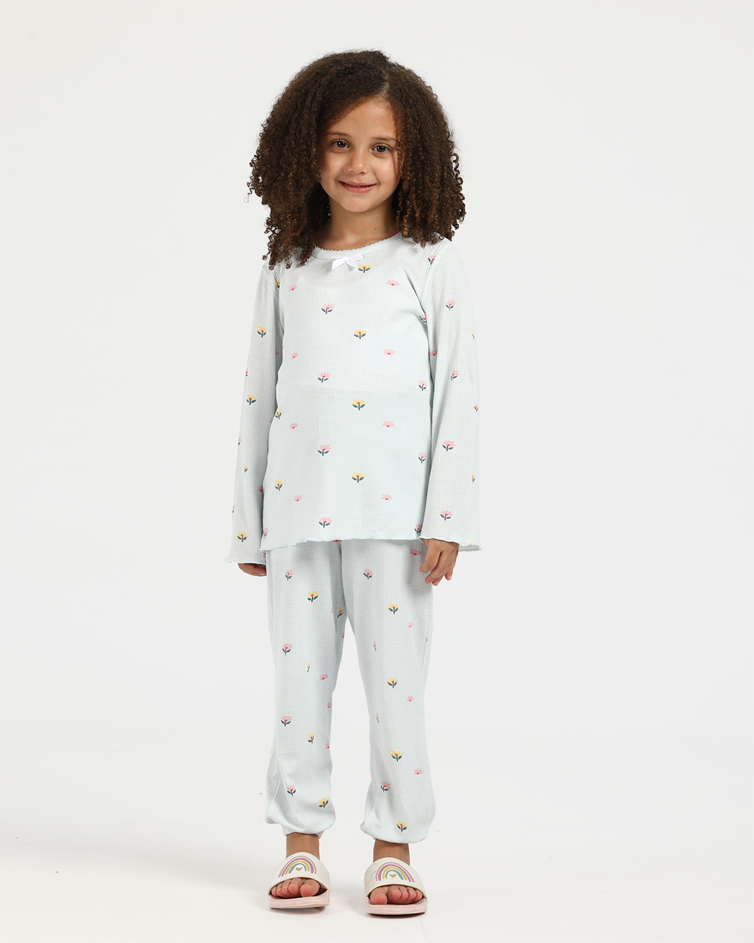Girls' pajama set with sleeves, stripes, and flowers